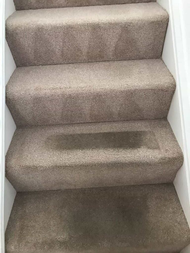 This is an after photo of a staircase with a beige carpet that has been cleaned works carried out by St Paul's Cray Carpet Cleaning