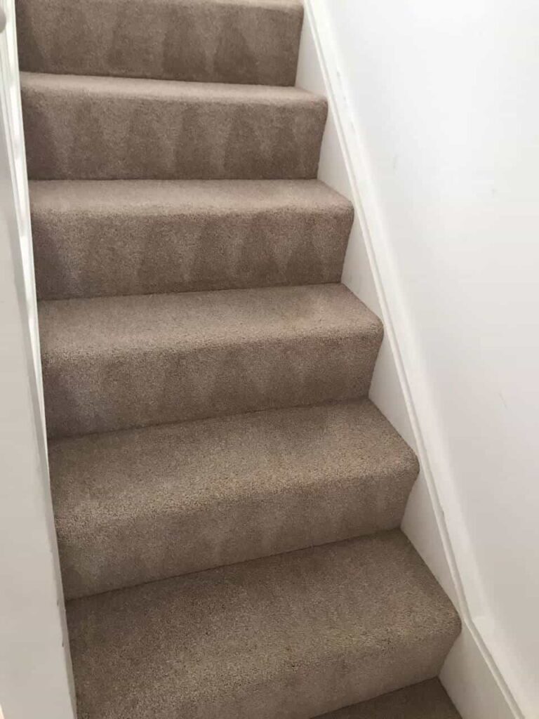 this is a photo of a staircase with beige carpets that is in the process of being cleaned works carried out by St Paul's Cray Carpet Cleaning